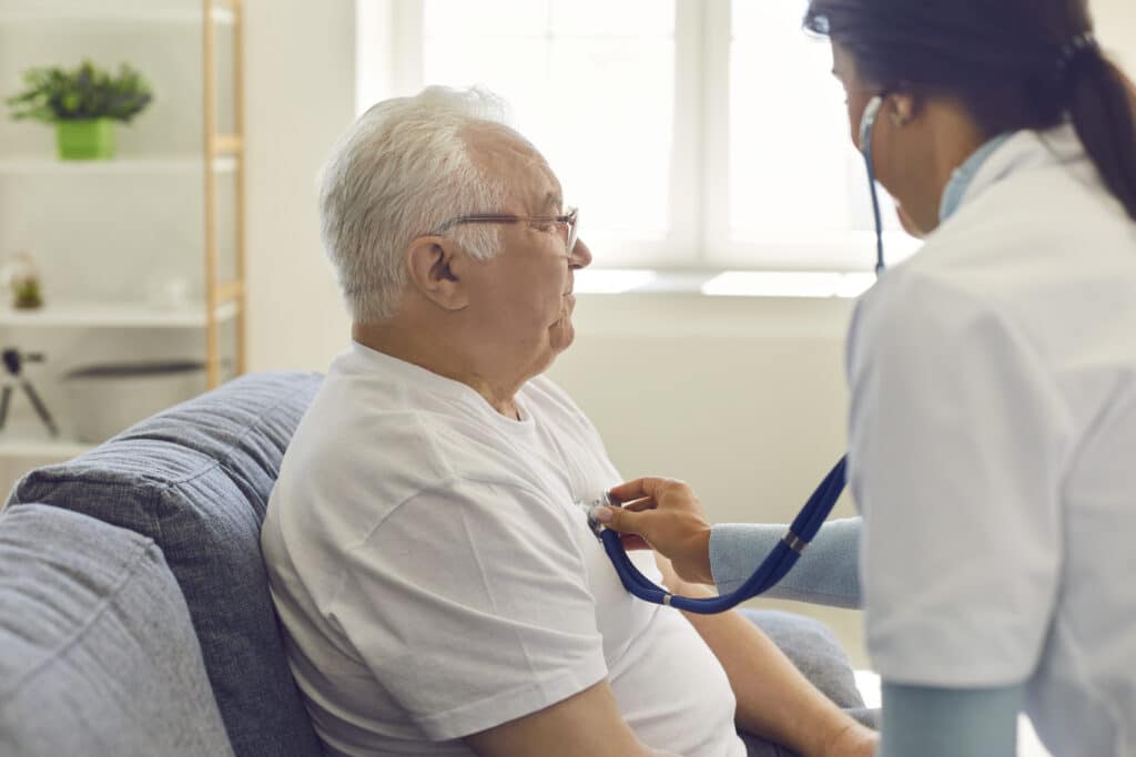 Nurse checking to patient
